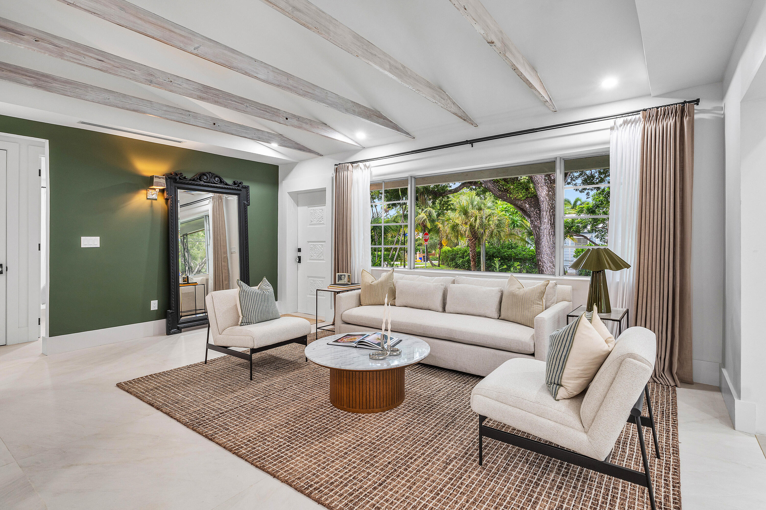 2330 Lake Avenue, Unit 2330 West Palm Beach, FL 33401 - Photo 6 of 44 a living room with furniture and a large window