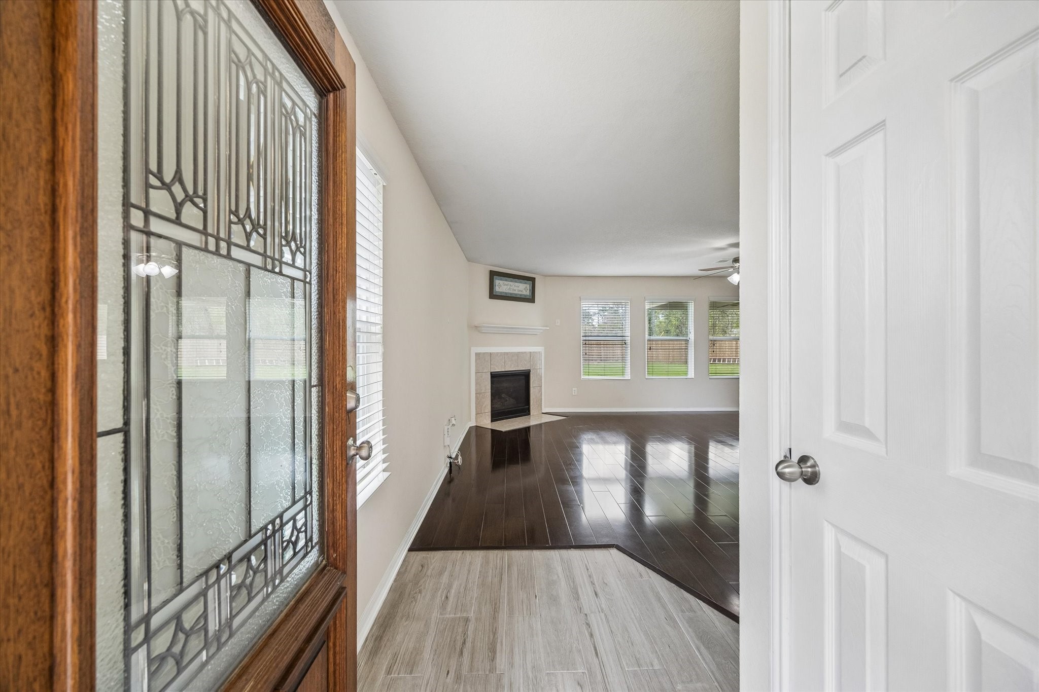 15642 South Fall Fern Circle Houston, TX 77044 - Photo 11 of 32 a view of a hallway with wooden floor and staircase