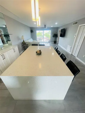 a bed sitting in a room next to a window