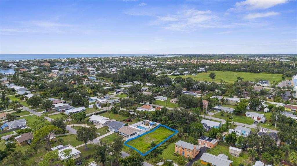 216 Pavonia Road Nokomis, FL 34275 - Photo 3 of 12 an aerial view of a city with lots of residential buildings