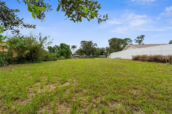 a view of a yard with an outdoor space