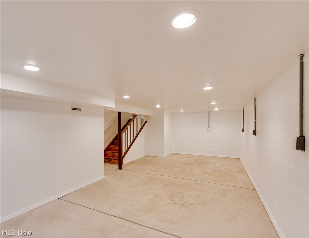 38705 Chardon Road Willoughby Hills, OH 44094 - Photo 28 of 35 Another view of the lower level with the stairs leading up to the main floor - such a lot of room - see this one today - you won't be sorry