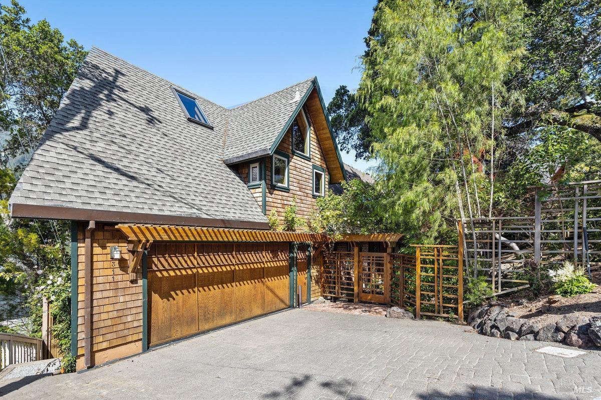 a front view of a house with a garage