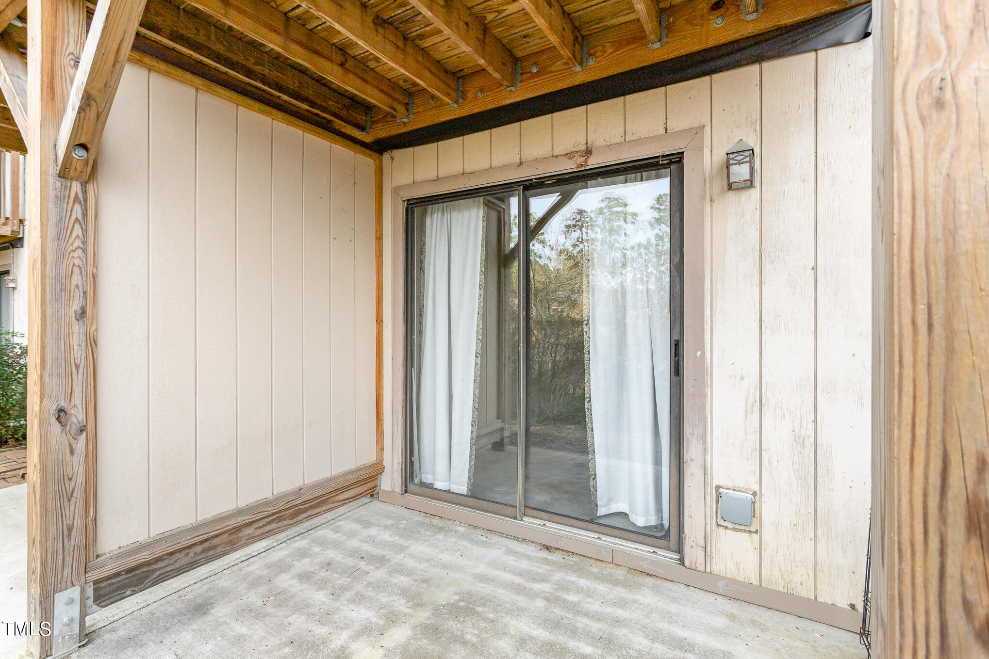 3051 Huntleigh Drive Raleigh, NC 27604 - Photo 14 of 16 a view of a room with wooden walls