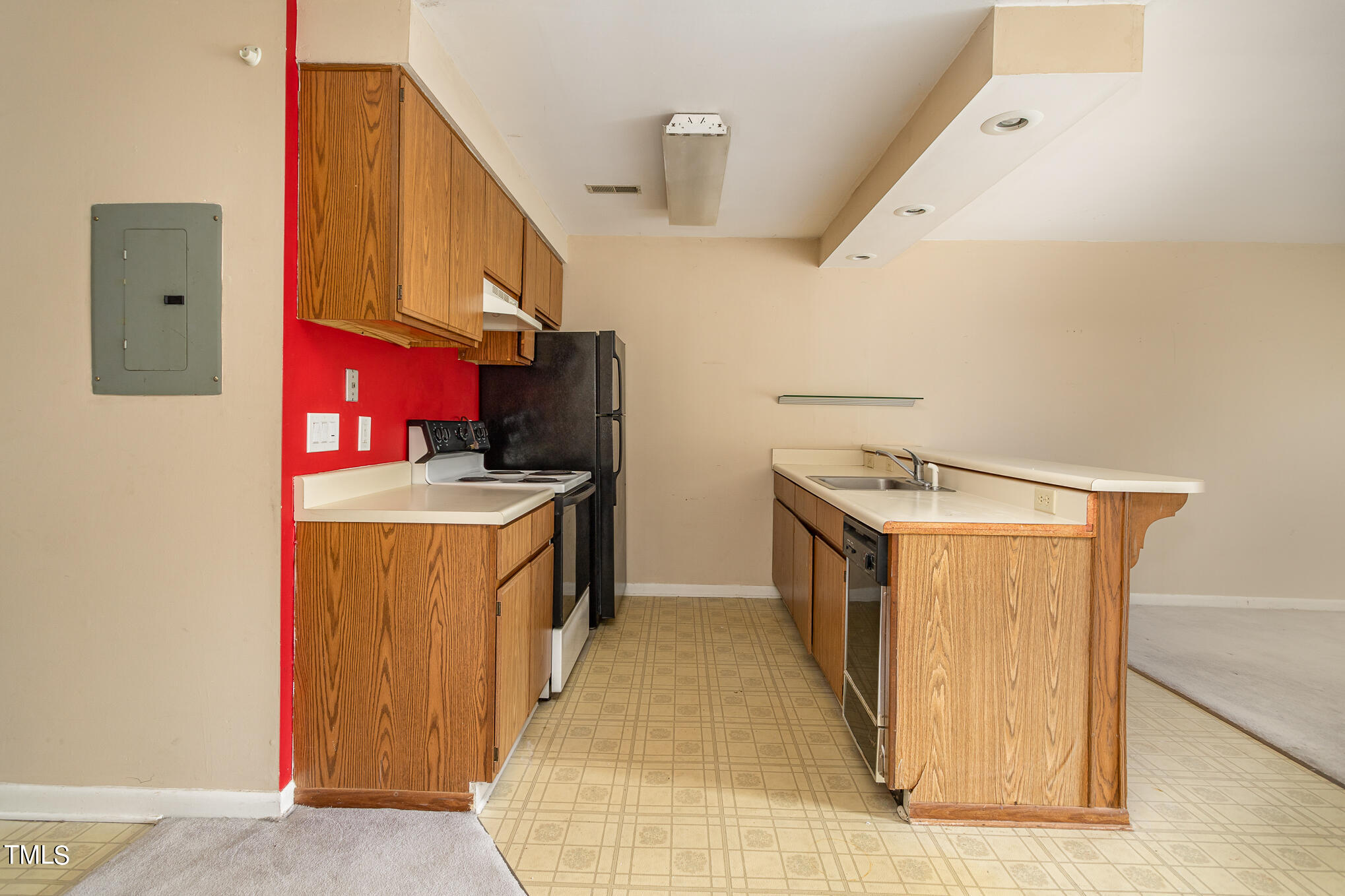 3051 Huntleigh Drive Raleigh, NC 27604 - Photo 4 of 16 a utility room with cabinets washer and dryer