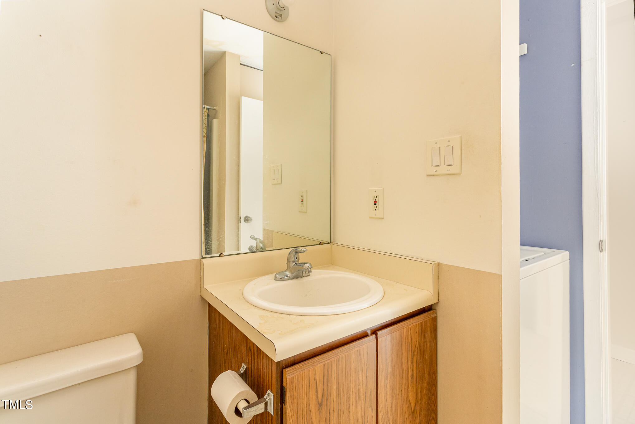 3051 Huntleigh Drive Raleigh, NC 27604 - Photo 9 of 16 a bathroom with a sink and a toilet