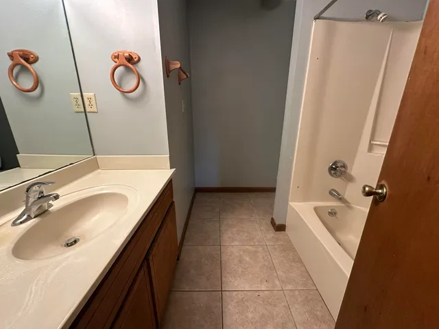 a bathroom with a sink and a tub