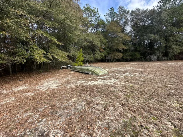 a view of outdoor space and yard