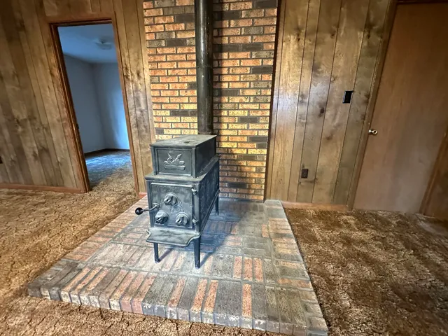 a living room with a couch and a rug