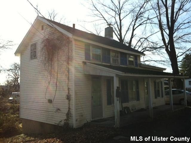 22 Post Street Saugerties, NY 12477 - Photo 3 of 14 a backyard of a house with seating space