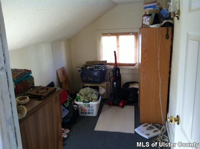 22 Post Street Saugerties, NY 12477 - Photo 8 of 14 a room with furniture and a window