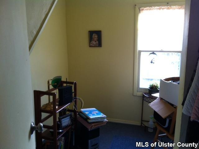 22 Post Street Saugerties, NY 12477 - Photo 10 of 14 a view of a workspace with furniture and a window