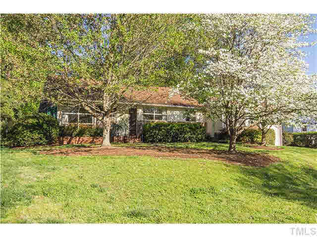 829 Bryan Street Raleigh, NC 27605 - Photo 1 of 23 a front view of a house with a yard