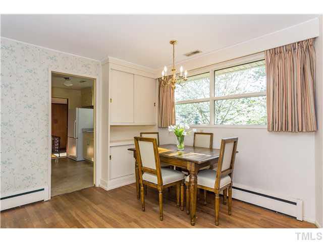 829 Bryan Street Raleigh, NC 27605 - Photo 7 of 23 a view of a dining room with furniture and window
