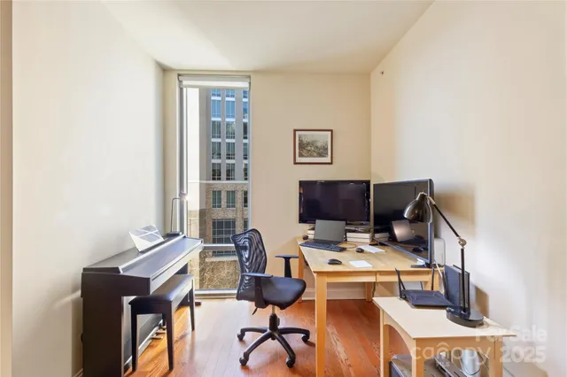 a view of a workspace with furniture