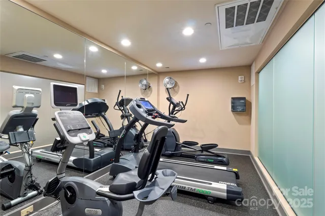 a view of a room with gym equipment
