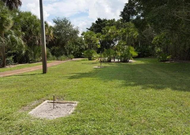 an aerial view of a house with outdoor space