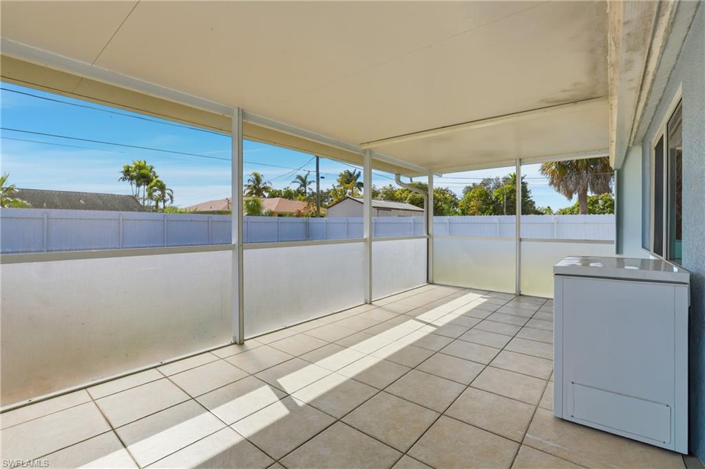 5312 17th Avenue Southwest Naples, FL 34116 - Photo 31 of 45 Unfurnished sunroom featuring healthy amount of natural light