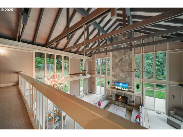 a view of living room with furniture and garden view