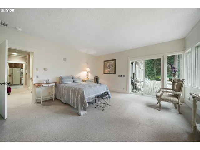 a bathroom with a sink double vanity granite and a mirror