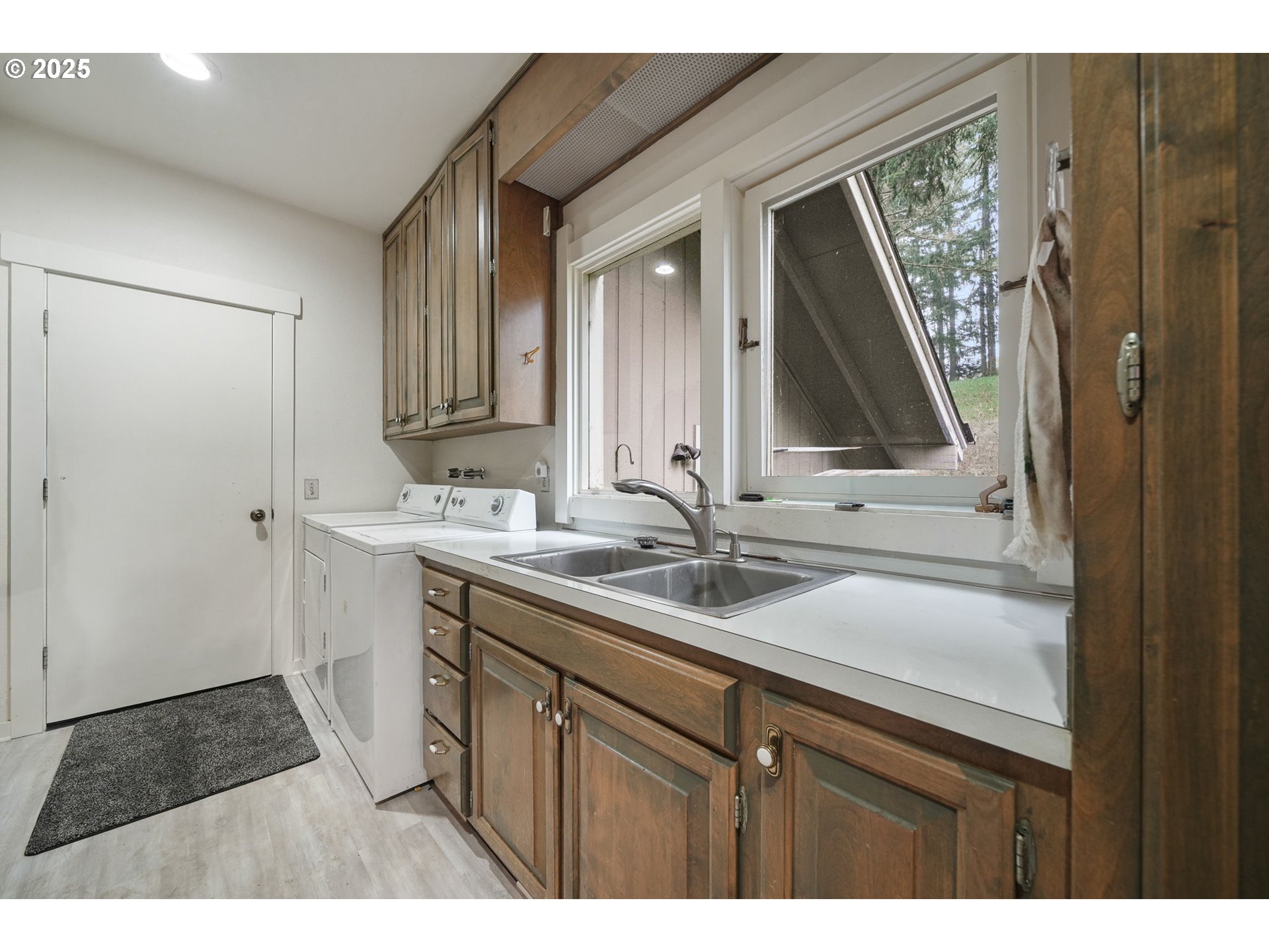 27415 Siuslaw Road Lorane, OR 97451 - Photo 33 of 48 a bathroom with a sink and a mirror