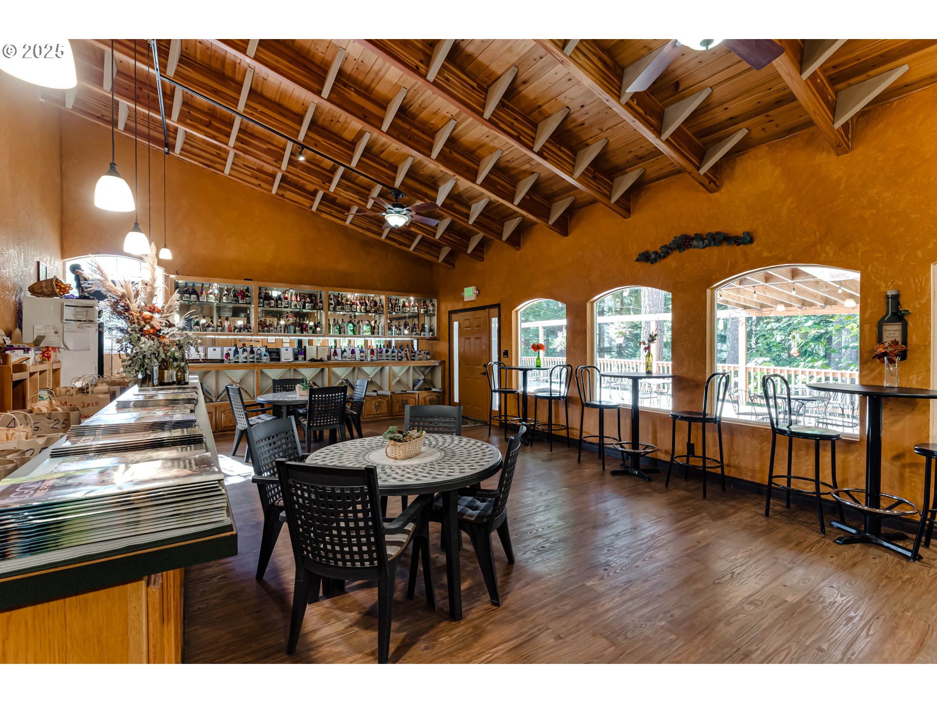 27415 Siuslaw Road Lorane, OR 97451 - Photo 38 of 48 a view of a dining room with furniture window and outside view