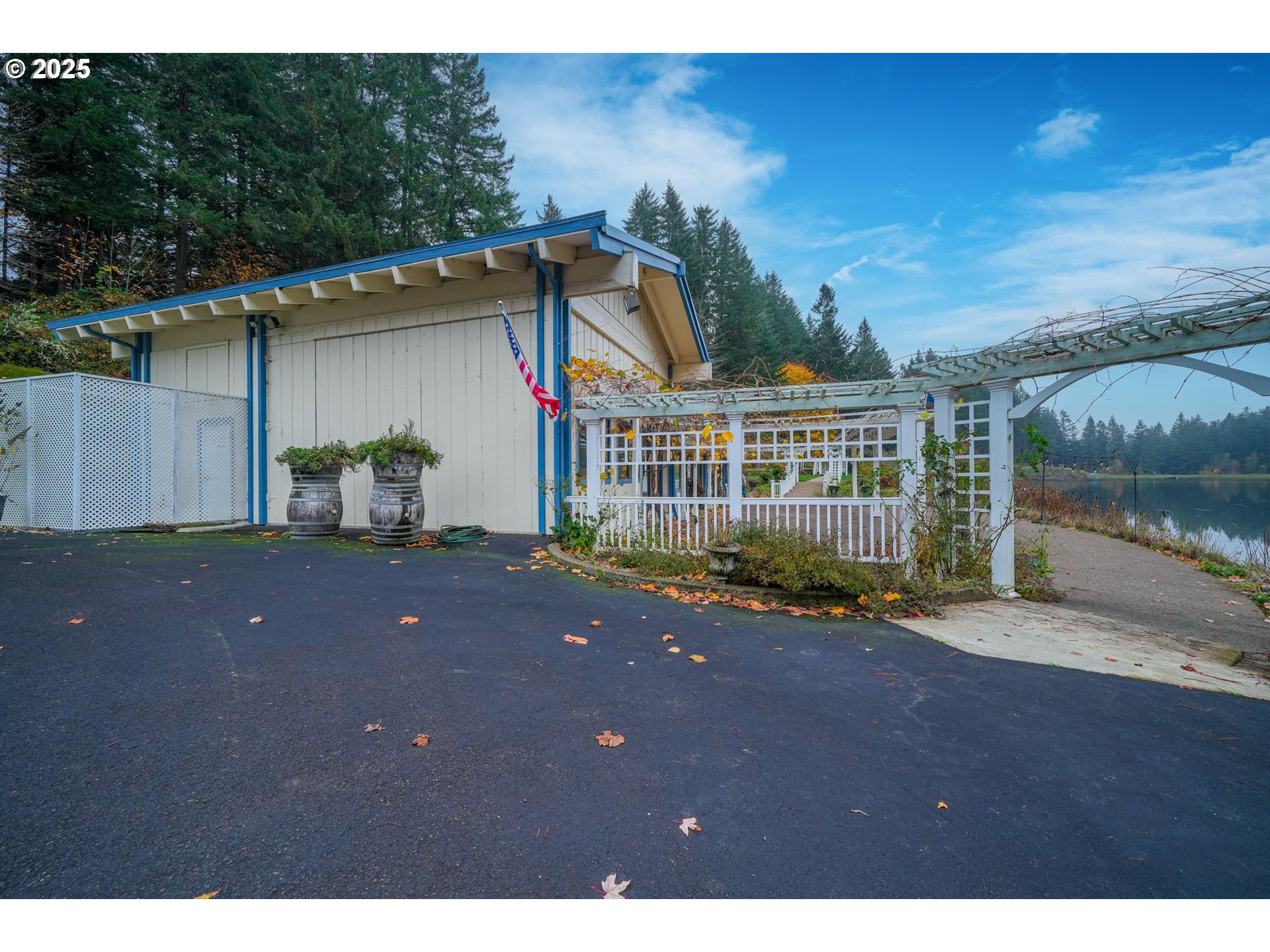 27415 Siuslaw Road Lorane, OR 97451 - Photo 42 of 48 a view of a house with a backyard