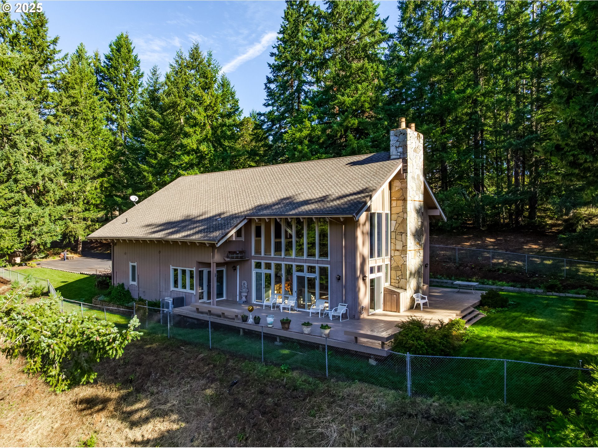 27415 Siuslaw Road Lorane, OR 97451 - Photo 45 of 48 a backyard of a house with lots of green space