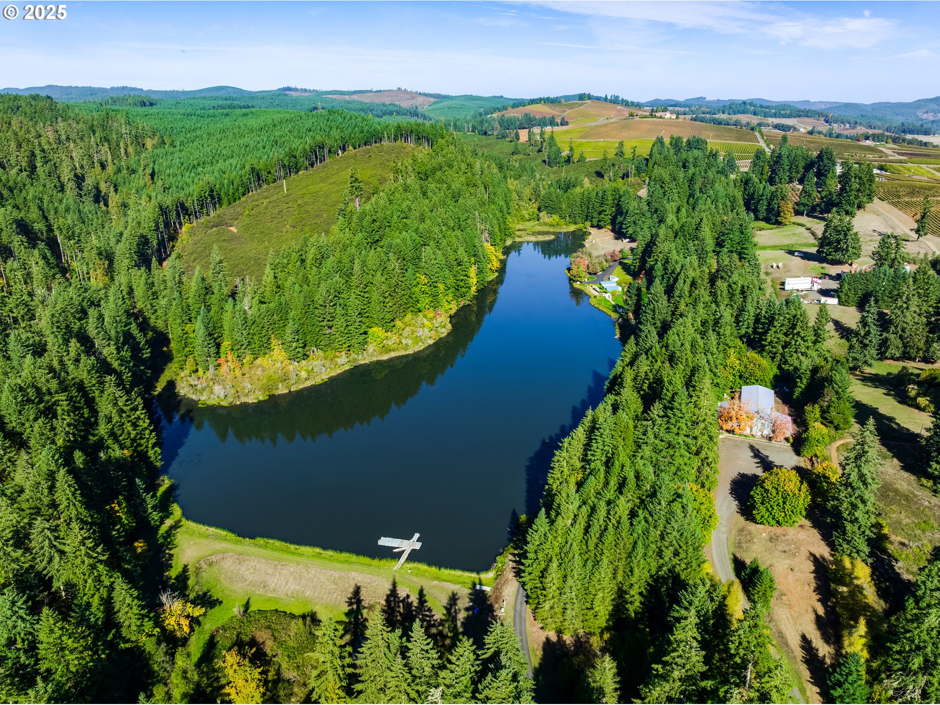 27415 Siuslaw Road Lorane, OR 97451 - Photo 48 of 48 a view of a garden with a lake