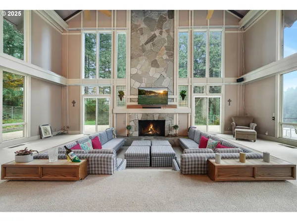 a outdoor living space with furniture and a fireplace