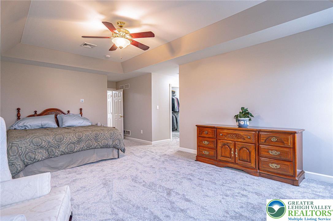 6551 Overlook Road Orefield, PA 18069 - Photo 42 of 82 a bed room with a bed and a dresser