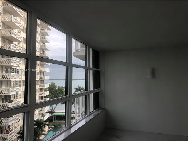 a bathroom with a double vanity sink and mirror