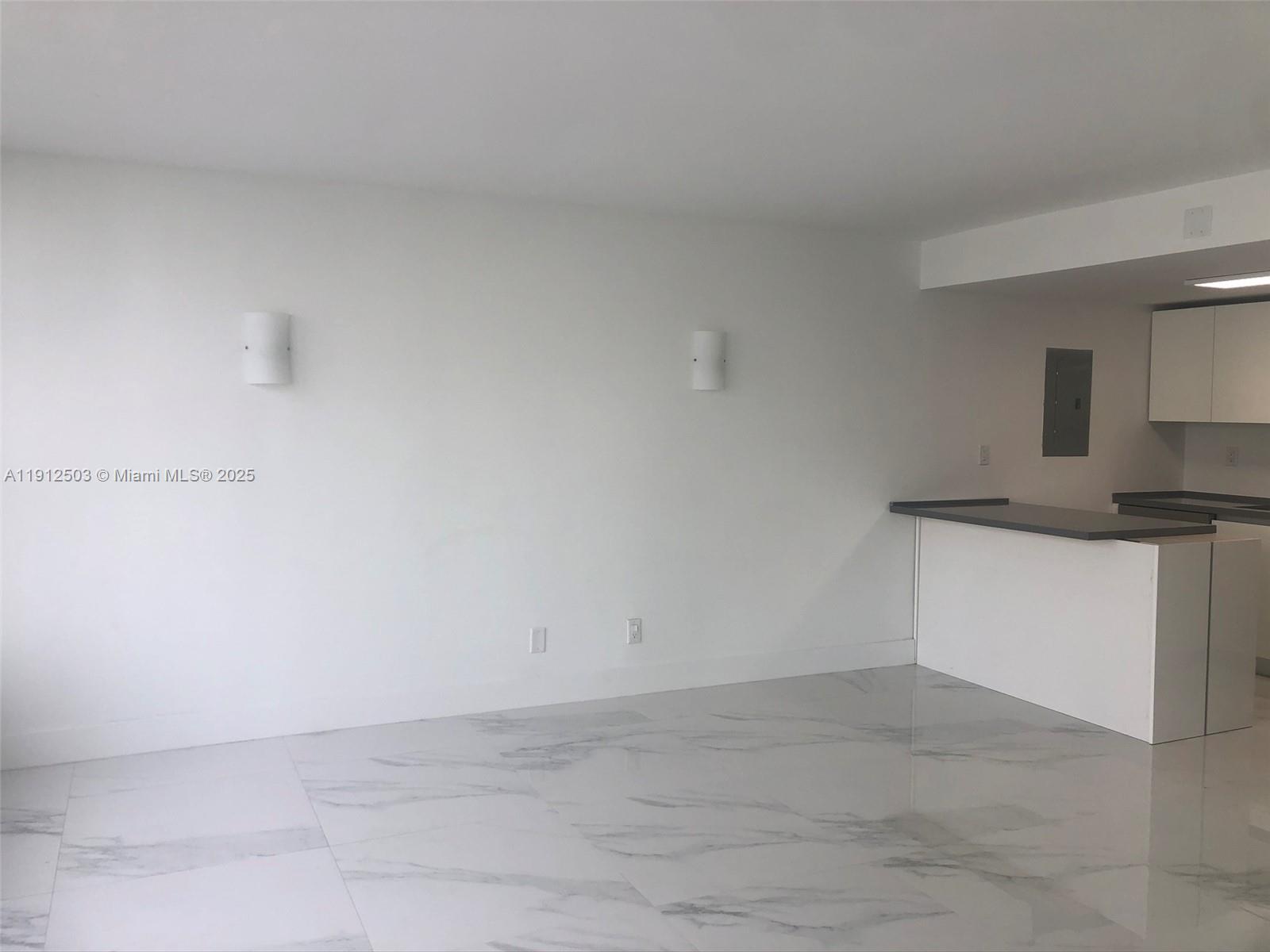 1440 Brickell Bay Drive, Unit 709 Miami, FL 33131 - Photo 4 of 13 a view of kitchen