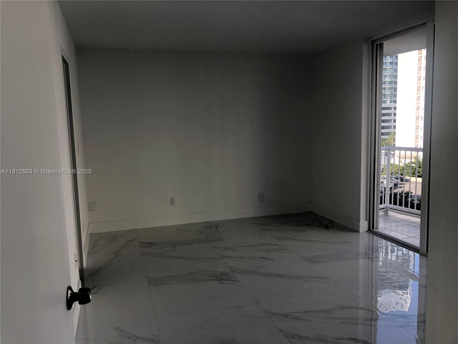 1440 Brickell Bay Drive, Unit 709 Miami, FL 33131 - Photo 7 of 13 a view of a hallway