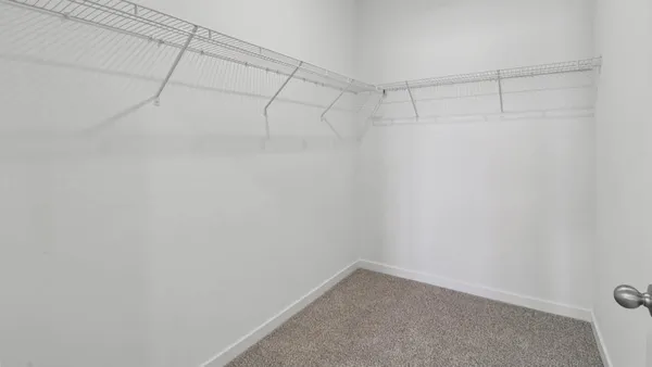 a view of a room with racks on the wall