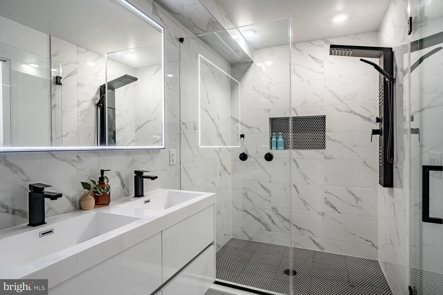 2607 East Boston Street, Unit 2 Philadelphia, PA 19125 - Photo 8 of 18 a bathroom with a sink and mirror