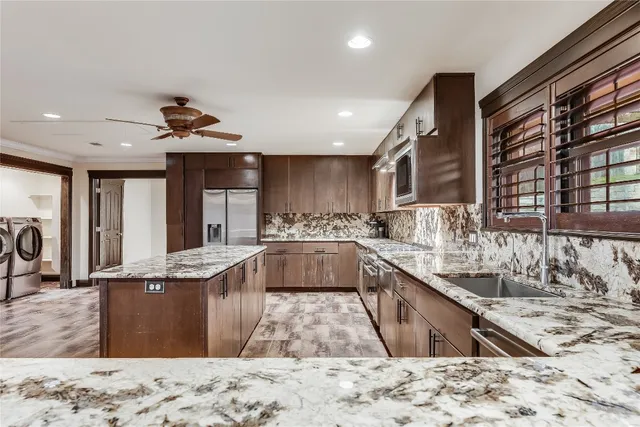 $6,000 | 4900 Balcones Drive, Austin, TX 78731