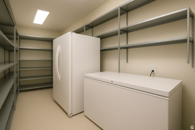 230 Boulder Way Leeds, UT 84746 - Photo 40 of 72 Laundry room featuring light tile patterned floors