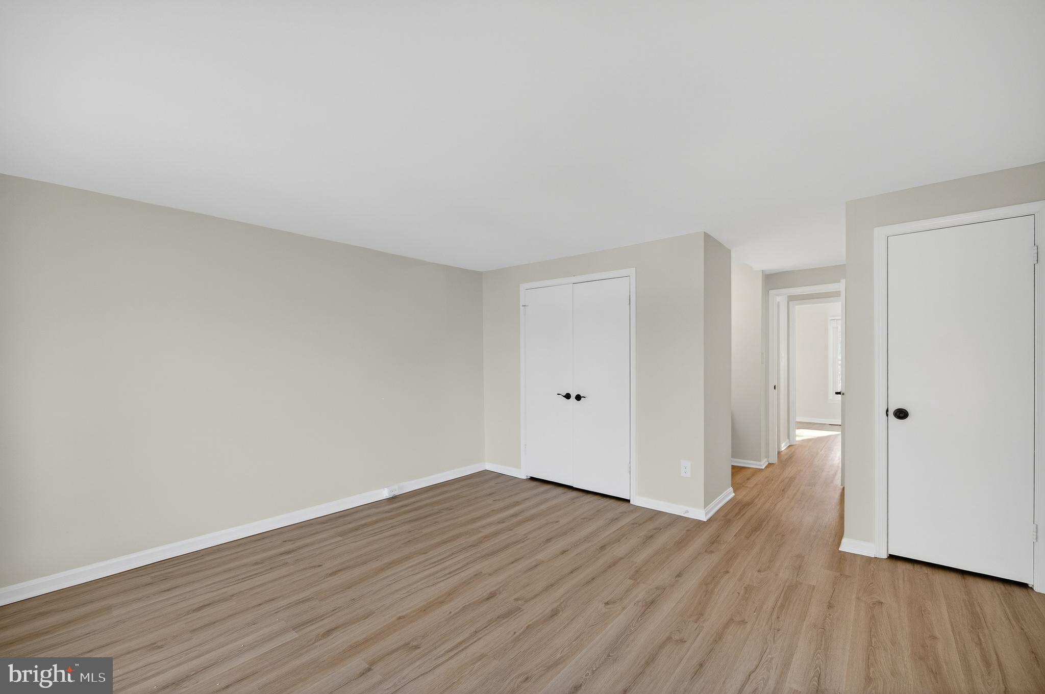 11920 Redtree Way Reston, VA 20194 - Photo 14 of 42 a view of an empty room with wooden floor