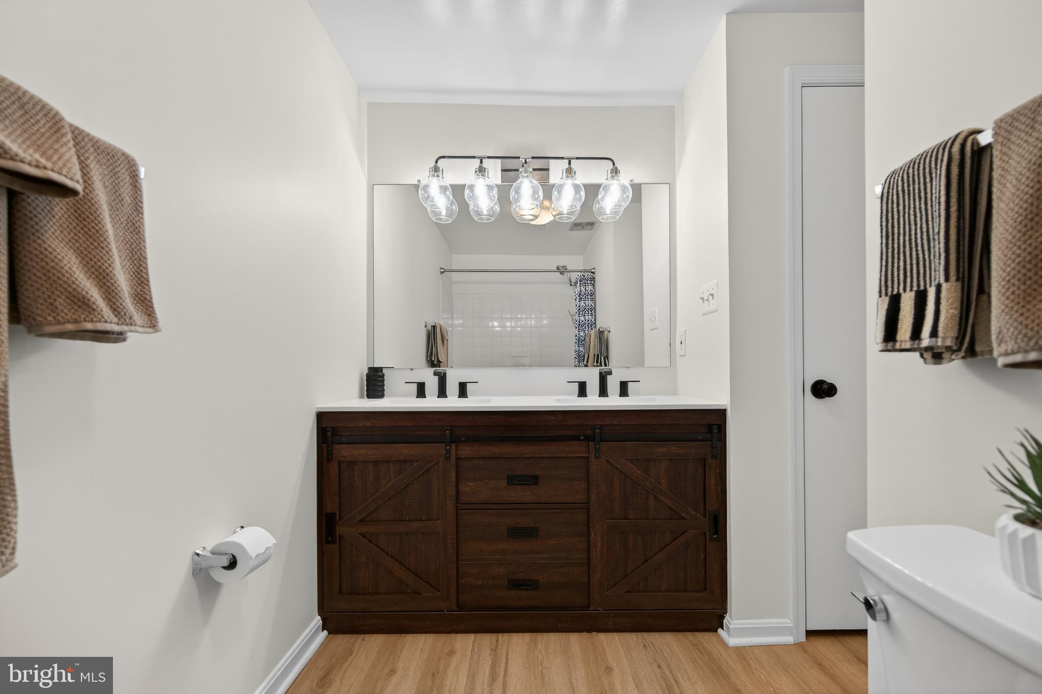 11920 Redtree Way Reston, VA 20194 - Photo 16 of 42 a bathroom with a sink and a mirror