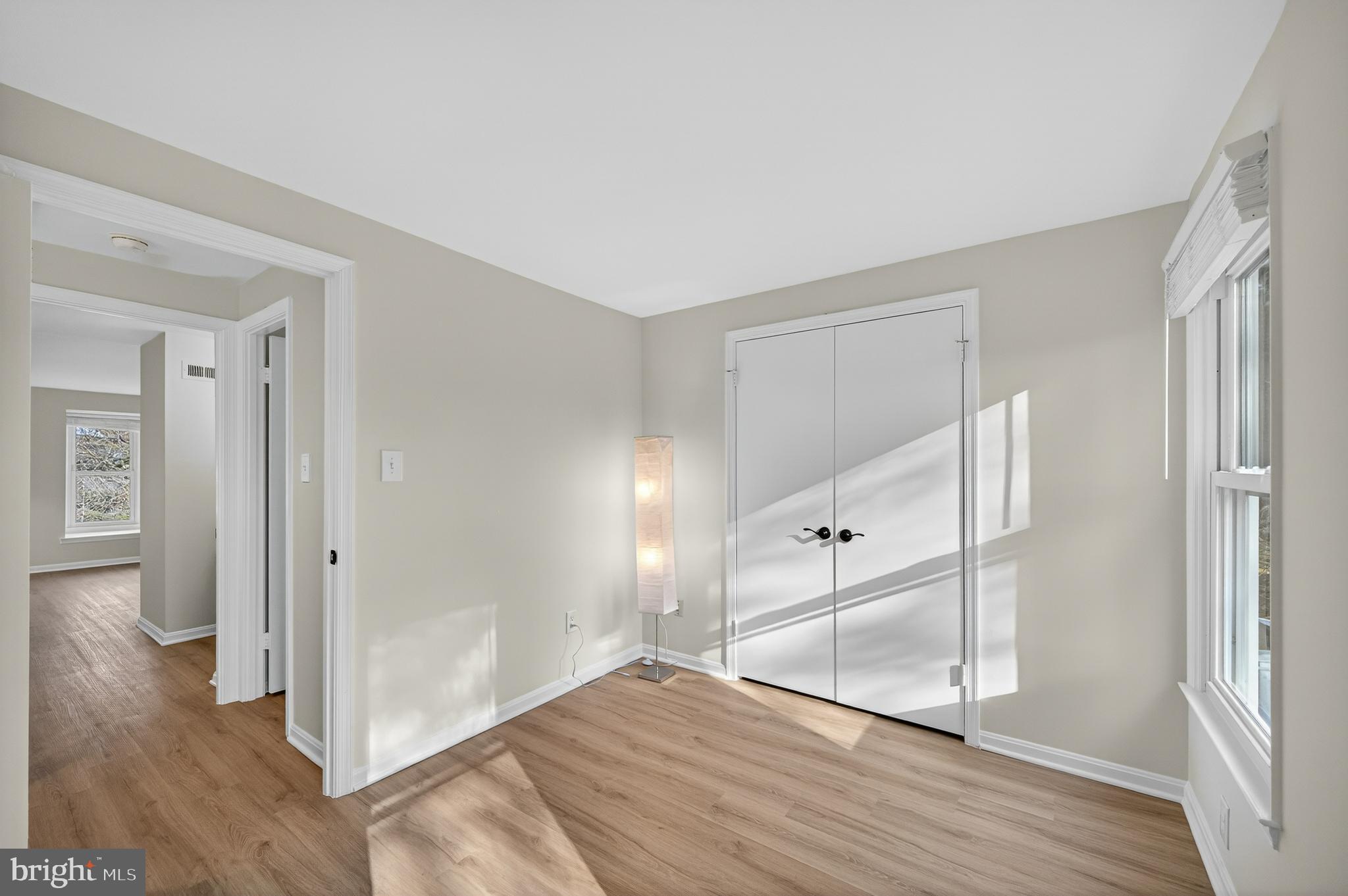11920 Redtree Way Reston, VA 20194 - Photo 19 of 42 a view of empty room with wooden floor and window