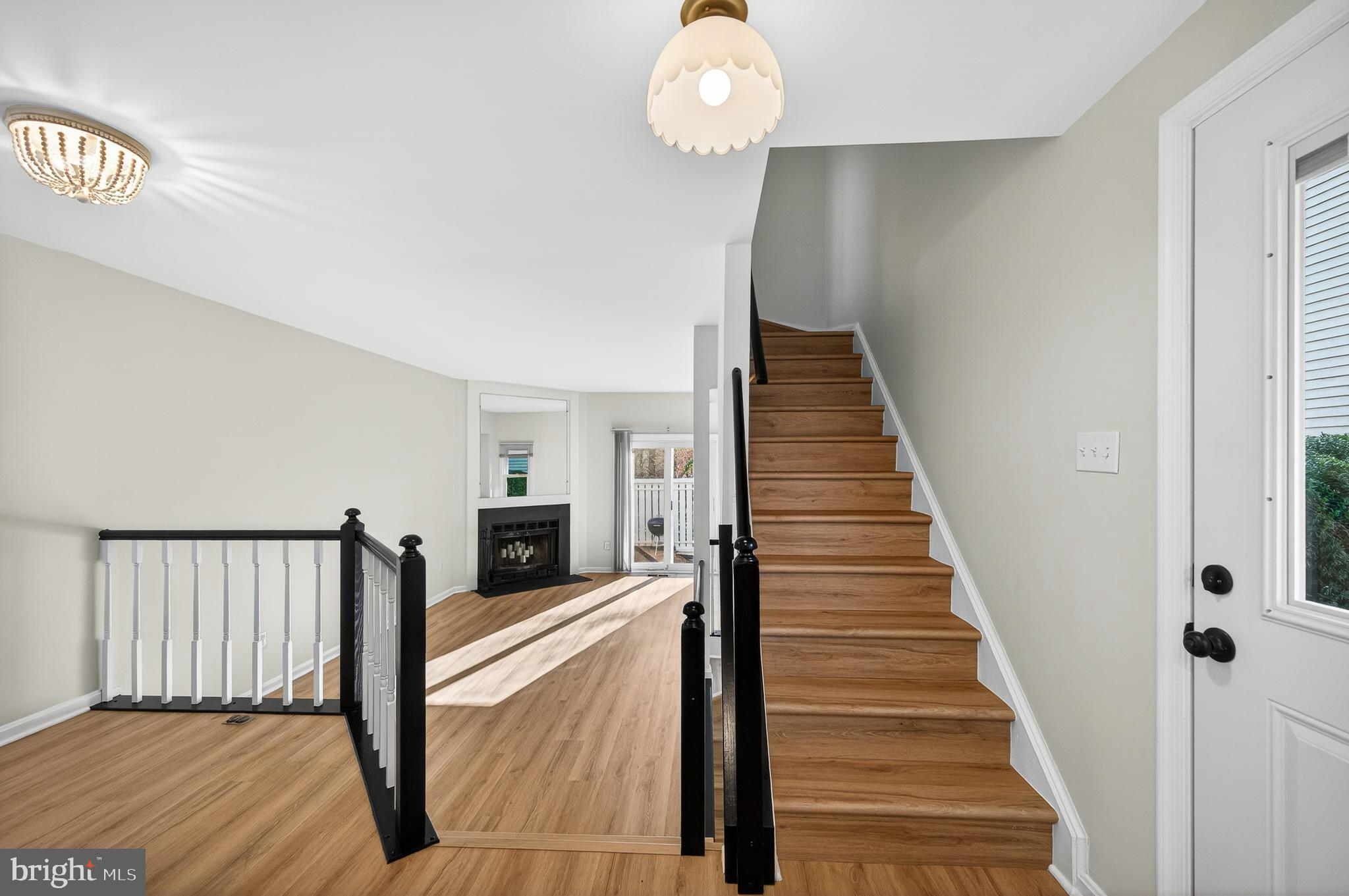 11920 Redtree Way Reston, VA 20194 - Photo 25 of 42 a view of a hallway with wooden floor and staircase