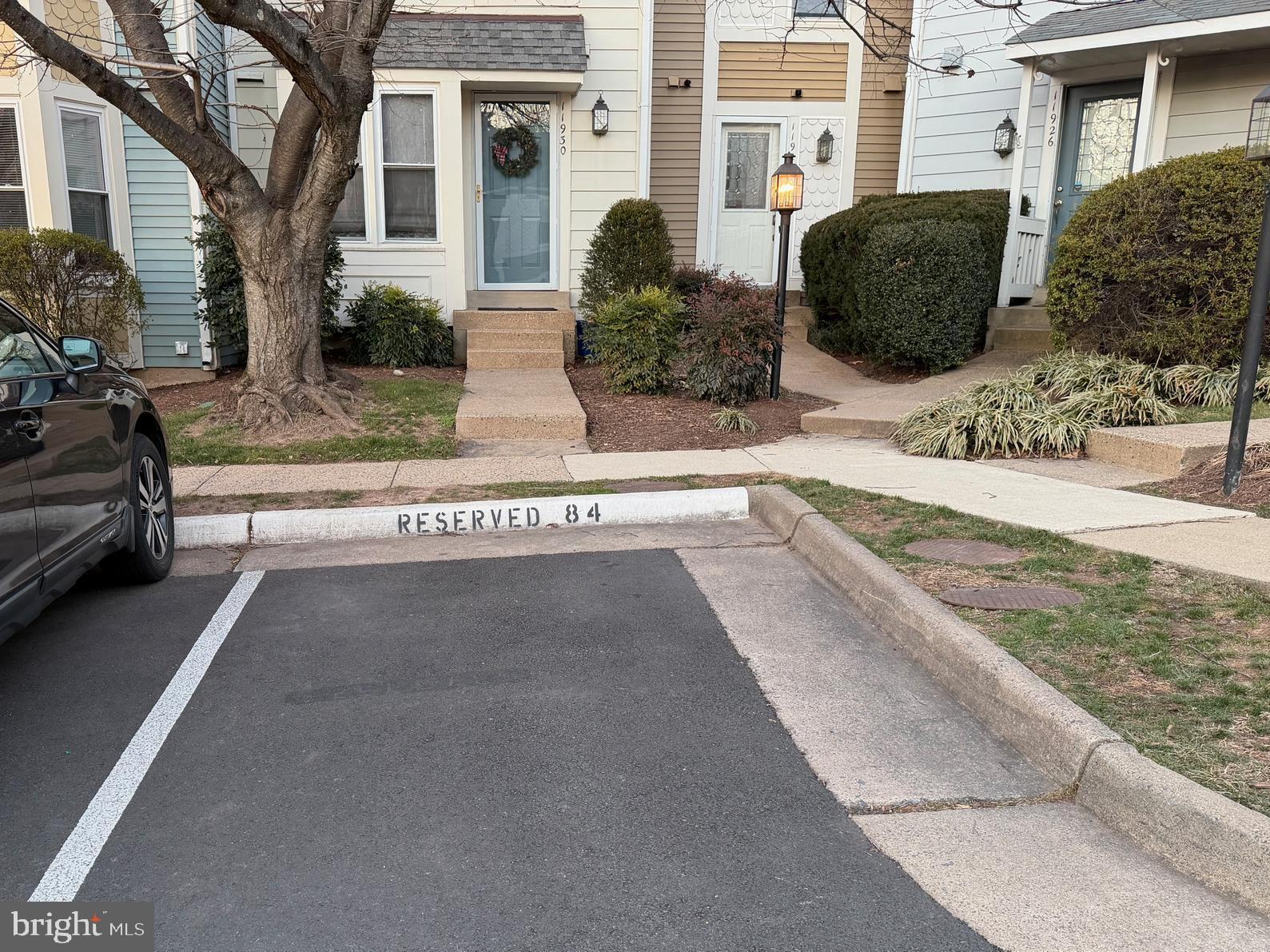 11920 Redtree Way Reston, VA 20194 - Photo 33 of 42 a front view of a house with a yard