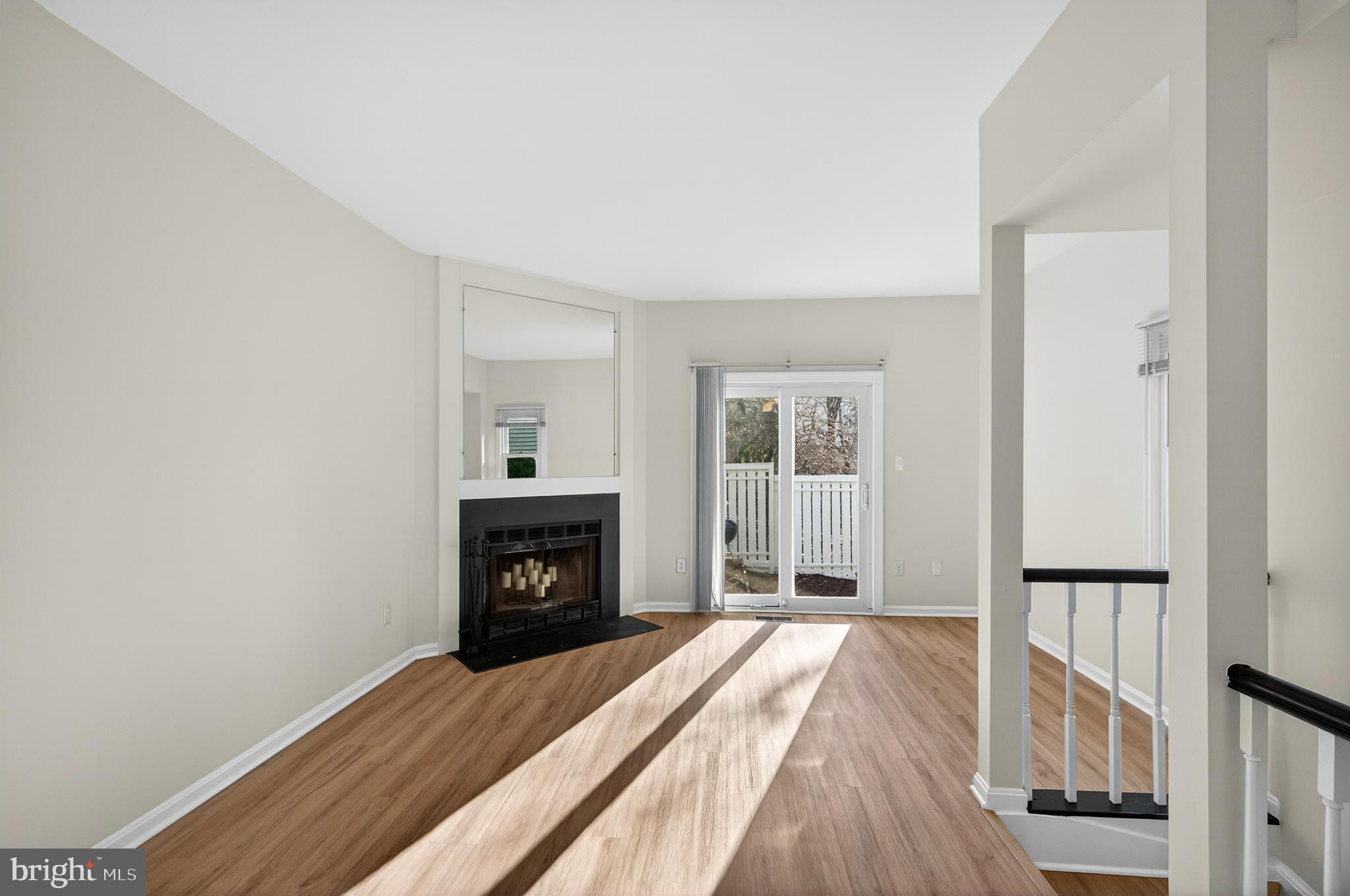 11920 Redtree Way Reston, VA 20194 - Photo 4 of 42 a bedroom with a bed and a fireplace