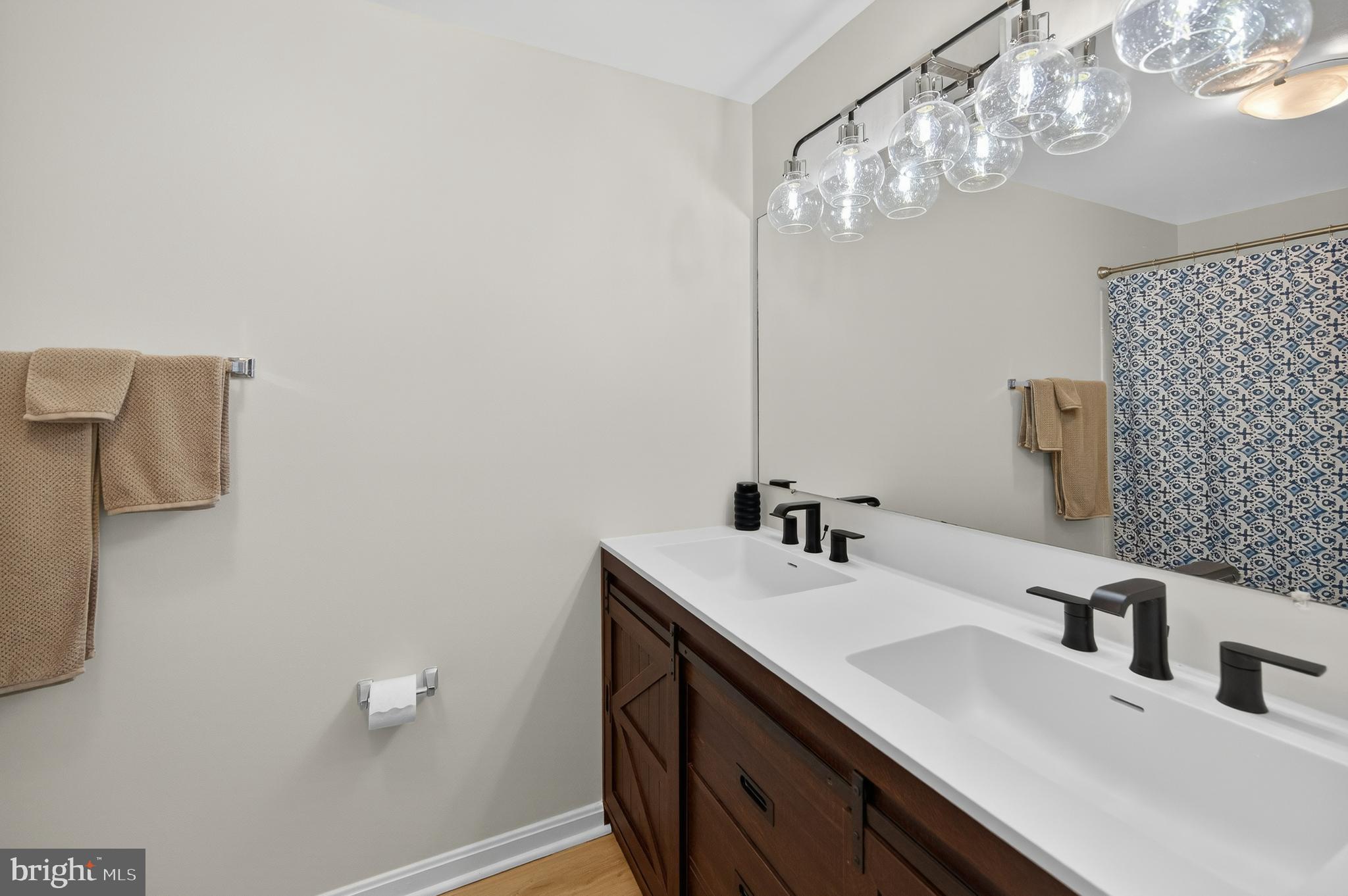 11920 Redtree Way Reston, VA 20194 - Photo 6 of 42 a bathroom with a sink vanity and a mirror