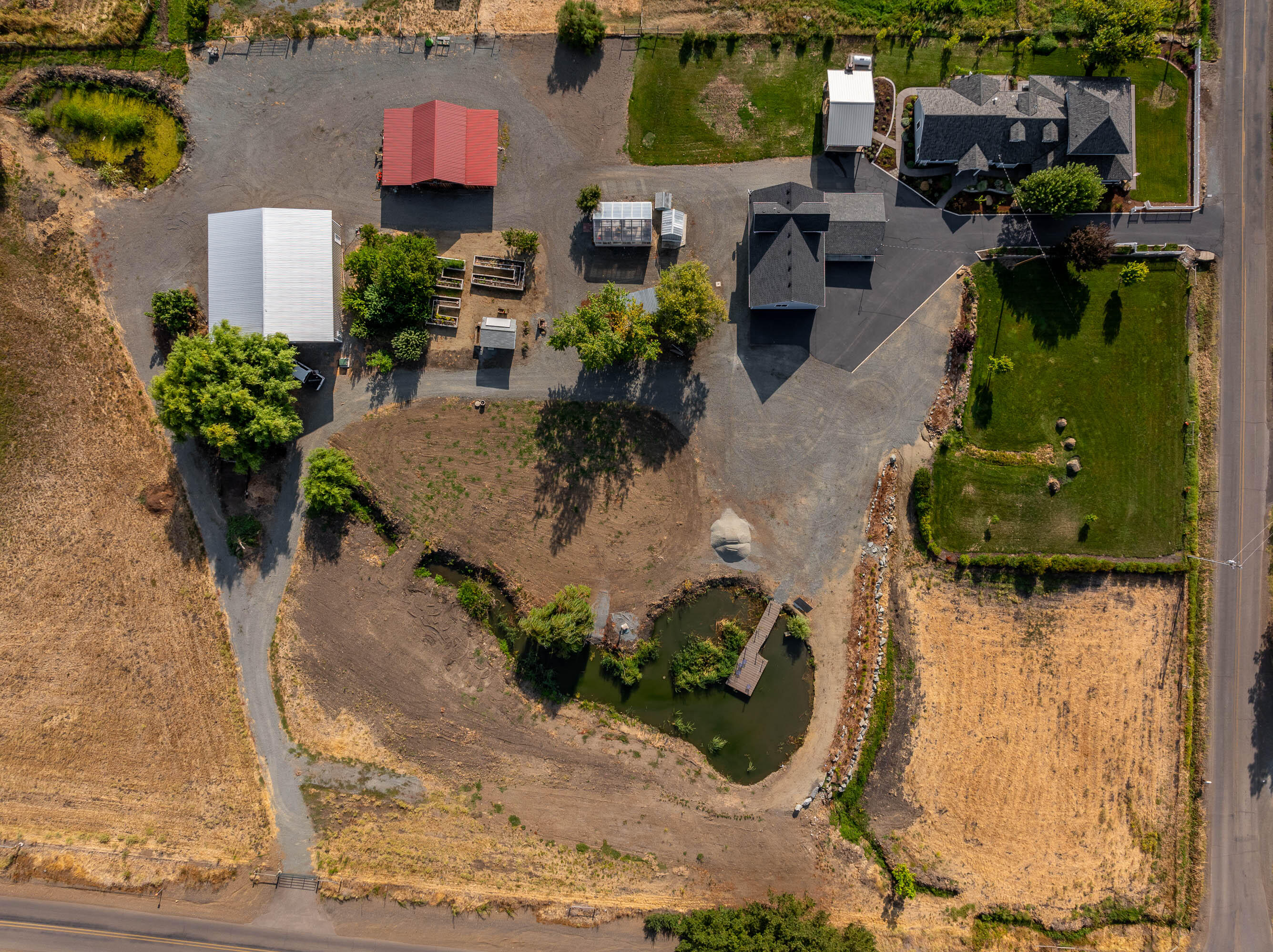 995 Suncrest Road Talent, OR 97540 - Photo 45 of 96 an aerial view of a house with a yard and sitting area