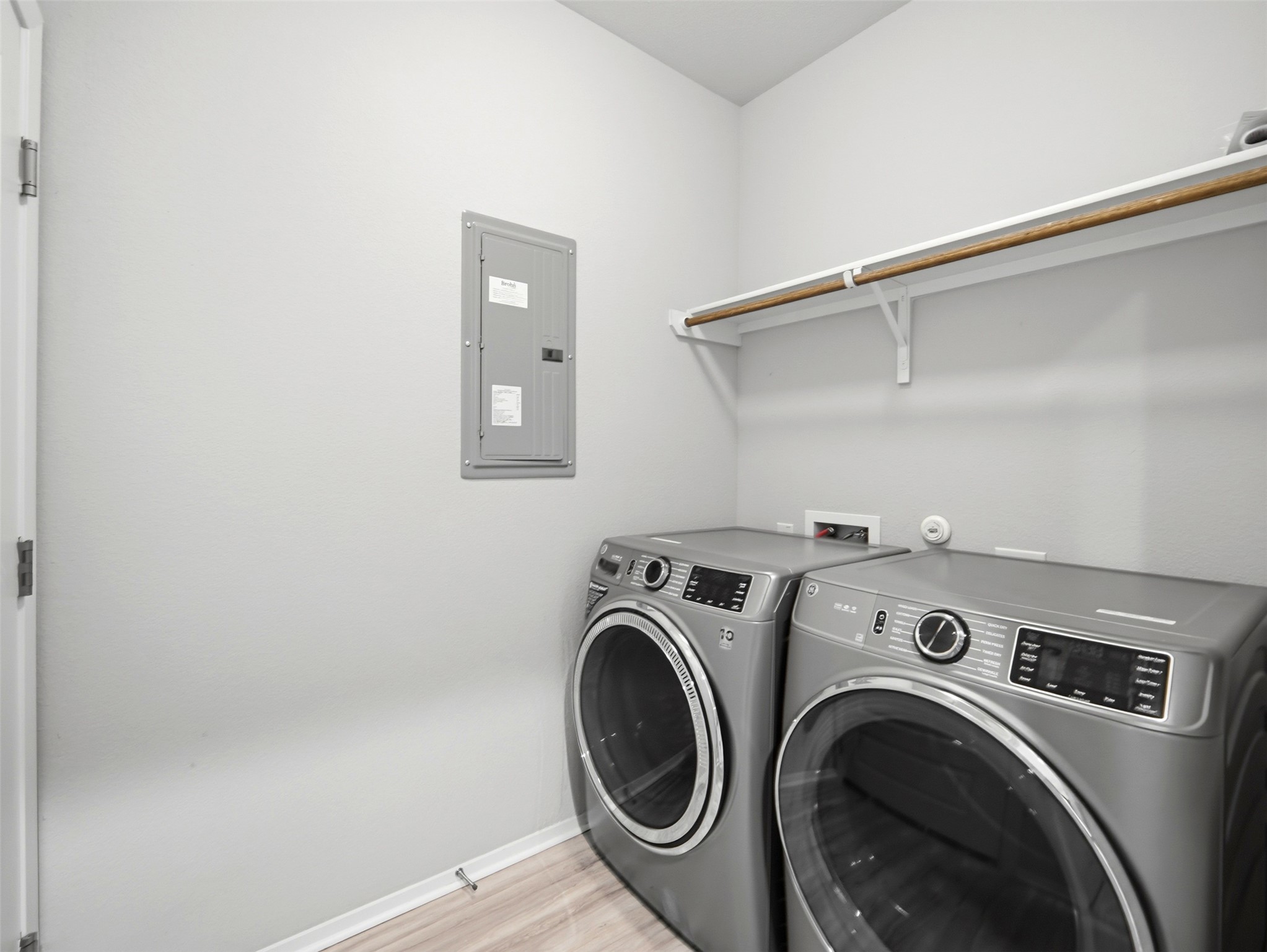 60 Bent Trl Lane Georgetown, TX 78628 - Photo 34 of 40 Streamlined laundry area with convenient shelving offers practical utility.