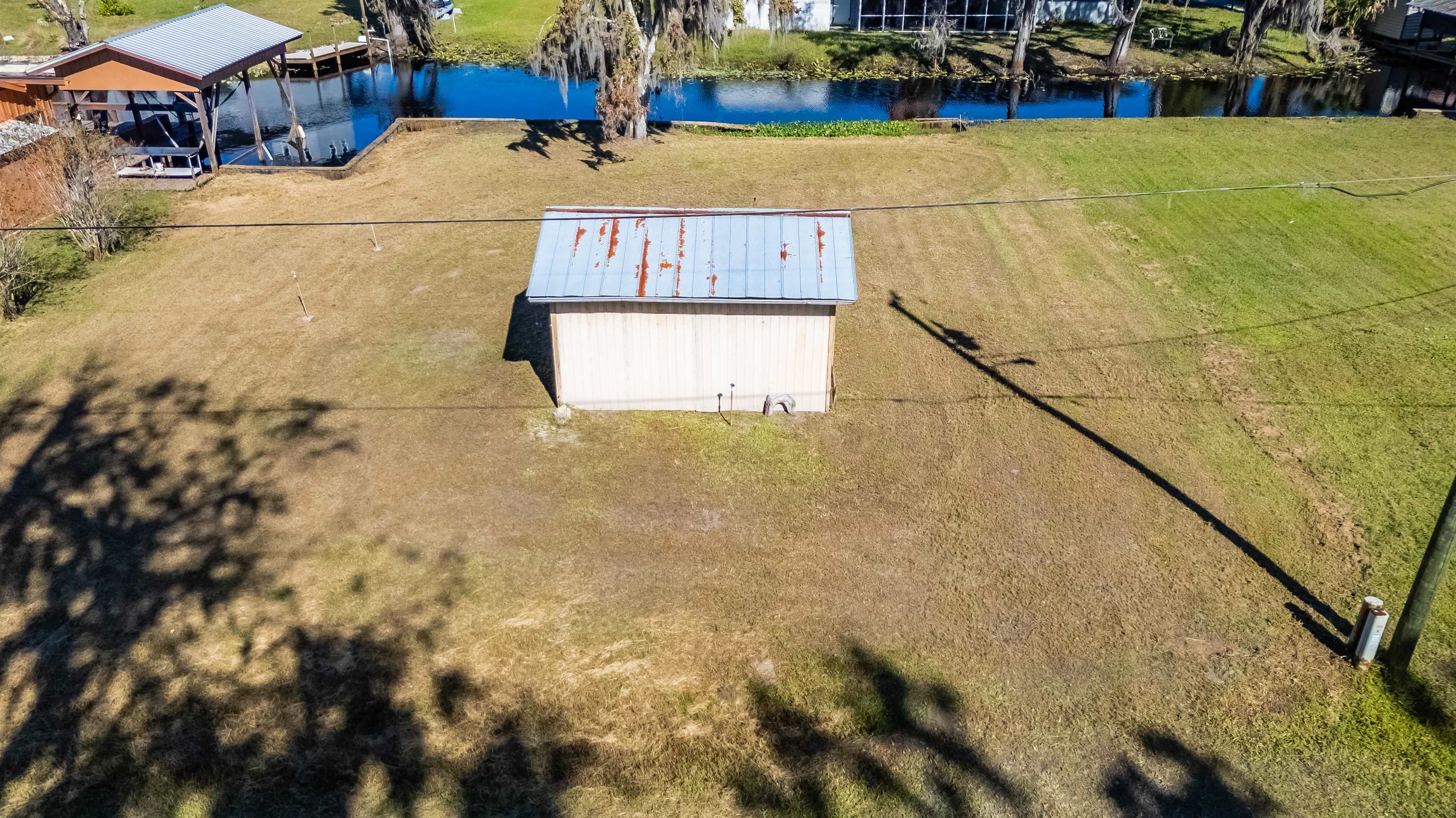 142 Hick's Avenue Crescent City, FL 32112 - Photo 1 of 16 a view of swimming pool with outdoor seating