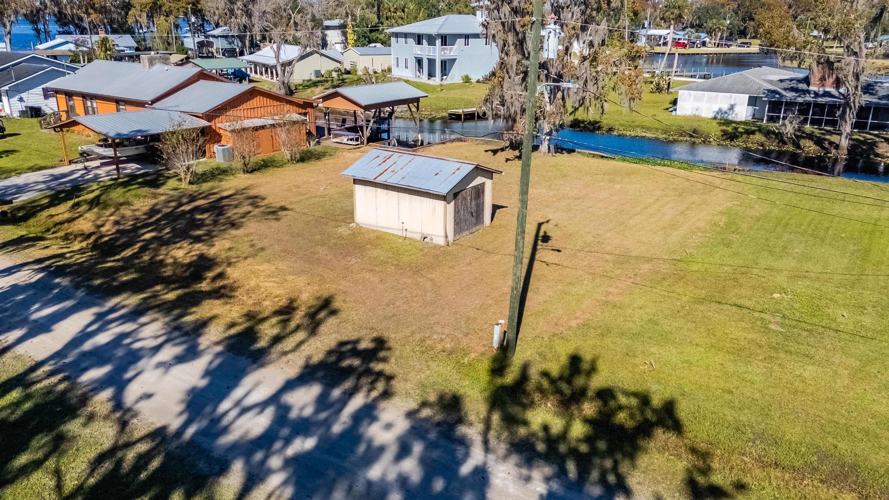 142 Hick's Avenue Crescent City, FL 32112 - Photo 11 of 16 a aerial view of residential houses with outdoor space