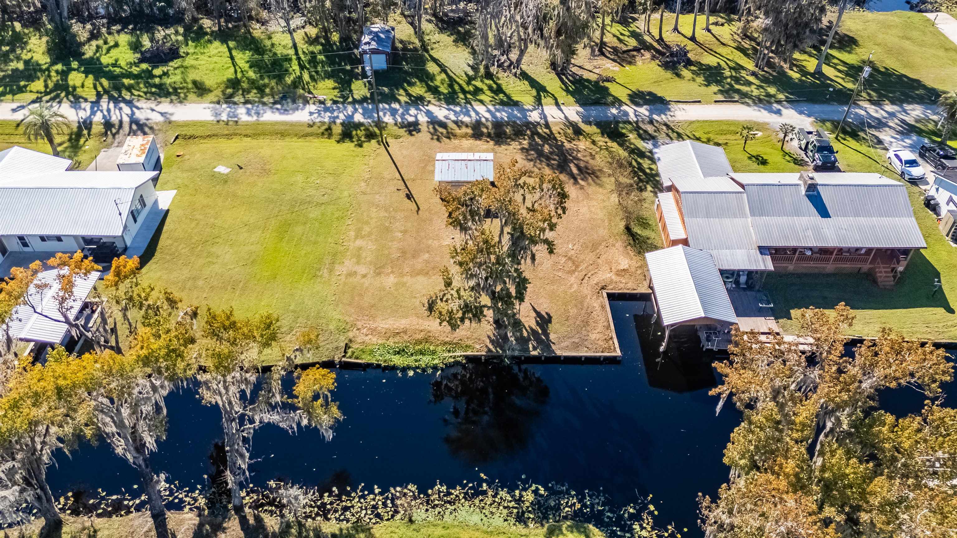 142 Hick's Avenue Crescent City, FL 32112 - Photo 2 of 16 a view of a house with a yard